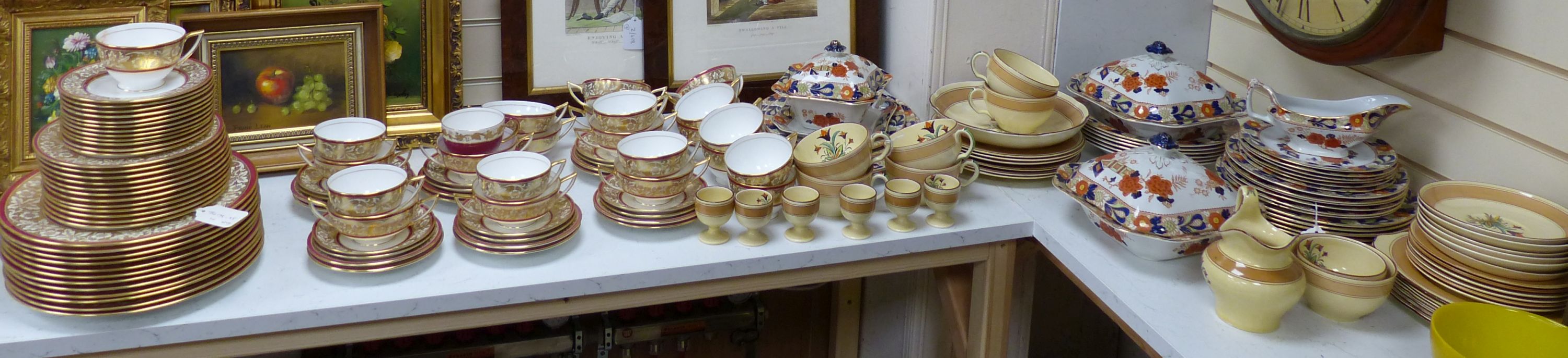 A Mintons breakfast set, a Minton part dinner service and a Woods floral-patterned part dinner service